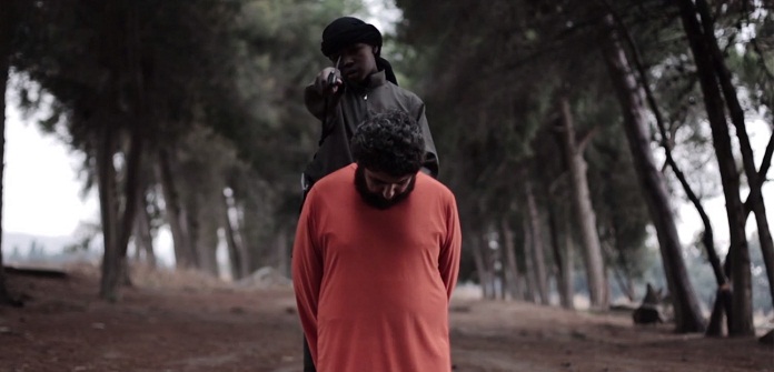 Shocking ISIS VIDEO shows English-speaking boy beheading man